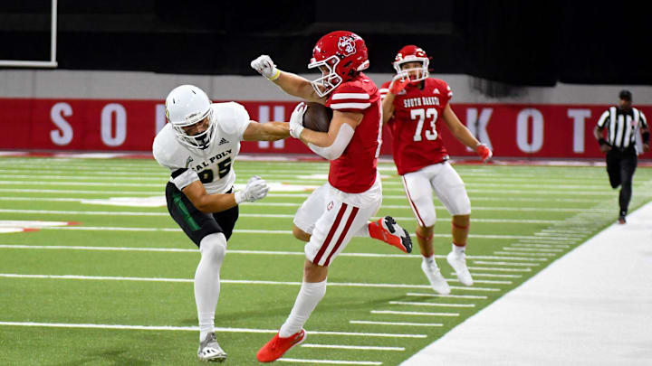 Carter Bell, a former Bettendorf standout, had a big day to help South Dakota advance to the FCS semifinals. Carter Bell, a former Bettendorf standout, had a big day to help South Dakota advance to the FCS semifinals.