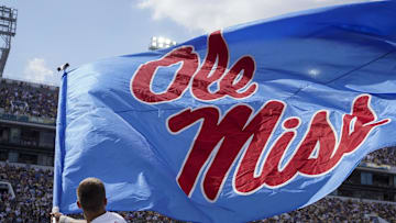 Sep 17, 2022; Atlanta, Georgia, USA; Mississippi Rebels cheerleader waves a flag after a touchdown against the Georgia Tech Yellow Jackets in the first quarter at Bobby Dodd Stadium. Mandatory Credit: Brett Davis-USA TODAY Sports
