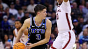 Mar 27, 2025; Newark, NJ, USA; Brigham Young Cougars guard Egor Demin (3) handles the ball against Alabama Crimson Tide forward Mouhamed Dioubate (10) during the second half during an East Regional semifinal of the 2025 NCAA tournament at Prudential Center. Mandatory Credit: Vincent Carchietta-Imagn Images
