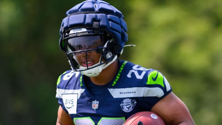 Jul 27, 2024; Renton, WA, USA; Seattle Seahawks running back Zach Charbonnet (26) during training camp at Virginia Mason Athletic Center.