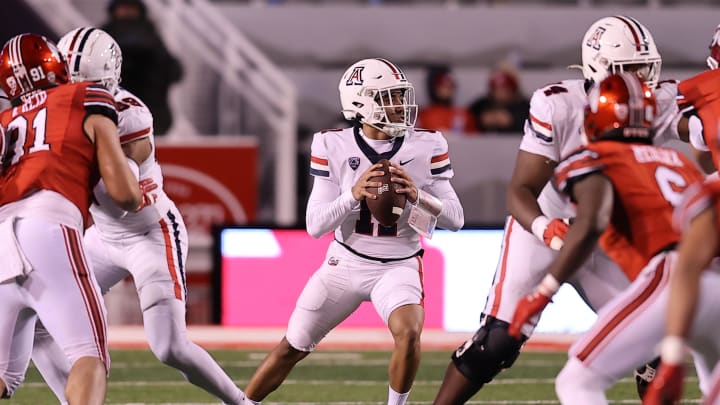 Nov 5, 2022; Salt Lake City, Utah, USA; Arizona Wildcats quarterback Noah Fifita (11) looks to pass the ball against the Utah Utes in the fourth quarter at Rice-Eccles Stadium.