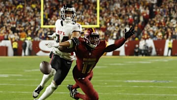 Dec 29, 2024; Landover, Maryland, USA; Washington Commanders wide receiver Terry McLaurin (17) attempts to catch a pass as Atlanta Falcons cornerback A.J. Terrell (24) defends during the third quarter at Northwest Stadium. Mandatory Credit: Geoff Burke-Imagn Images
