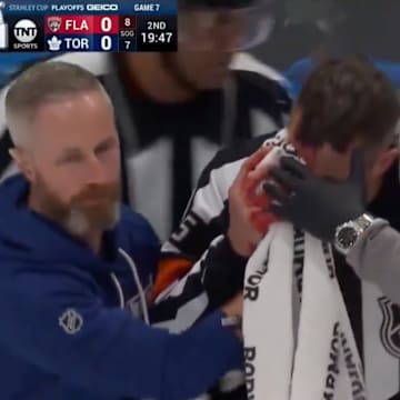 Chris Rooney suffered a cut when he was hit by a stick during Panthers-Leafs Game 7.