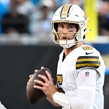 Nov 9, 2025; Charlotte, North Carolina, USA;  New Orleans Saints quarterback Tyler Shough (6) looks to pass in the fourth quarter at Bank of America Stadium. Mandatory Credit: Bob Donnan-Imagn Images