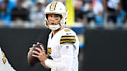 Nov 9, 2025; Charlotte, North Carolina, USA;  New Orleans Saints quarterback Tyler Shough (6) looks to pass in the fourth quarter at Bank of America Stadium. Mandatory Credit: Bob Donnan-Imagn Images