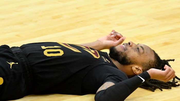 Mar 20, 2024; Cleveland, Ohio, USA; Cleveland Cavaliers guard Darius Garland (10) reacts after