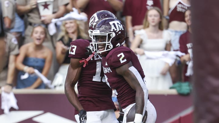 Sep 16, 2023; College Station, Texas, USA; Texas A&M Aggies running back Rueben Owens (2) celebrates with wide receiver Micah Tease (13) after scoring a touchdown during the third quarter against the Louisiana Monroe Warhawks at Kyle Field. Mandatory Credit: Troy Taormina-USA TODAY Sports