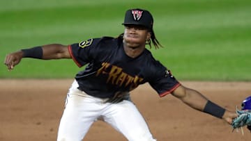 Wisconsin Timber Rattlers' Jesus Made (12) tags out Quad Cities River Bandits' Eridk Torres (4) at second base during their baseball game Wednesday, August 27, 2025, at Neuroscience Group Field at Fox Cities Stadium in Grand Chute, Wisconsin. Quad City won 9-5.