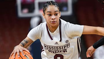 Mississippi State guard Jerkaila Jordan (2) moves the ball past Texas A & M guard Tineya Hylton (3) during the third quarter of the SEC Women's Basketball Tournament game three at the Bon Secours Wellness Arena in Greenville, S.C. Thursday, March 7, 2024.