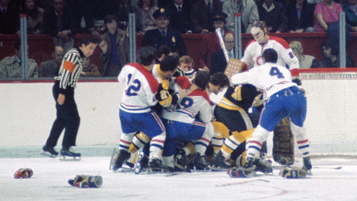 Boston Bruins and Montreal Canadiens scuffle in front of Canadiens goalie Ken Dryden (29) during the 1971 NHL quarterfinal playoff at Montreal Forum. The Canadiens defeated the Bruins 4 games to 3 on April 10, 1971.