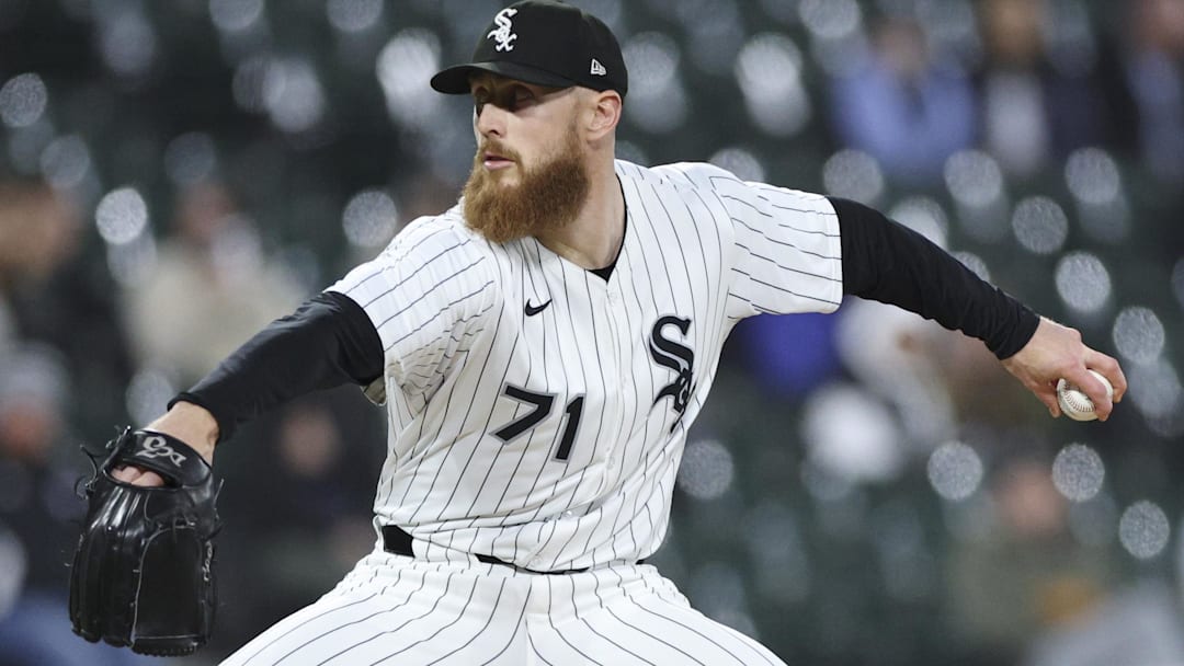 May 19, 2025; Chicago, Illinois, USA; Chicago White Sox relief pitcher Cam Booser (71) delivers a pitch against the Seattle Mariners during the eight inning at Rate Field. May 19, 2025; Chicago, Illinois, USA; Chicago White Sox relief pitcher Cam Booser (71) delivers a pitch against the Seattle Mariners during the eight inning at Rate Field.