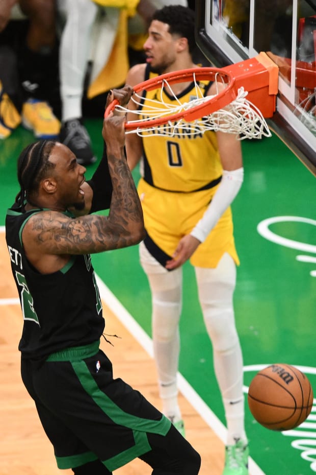 Boston Celtics forward Oshae Brissett (12) dunks vs. the Indiana Pacers during Game 2 of the 2024 Eastern Conference Finals.