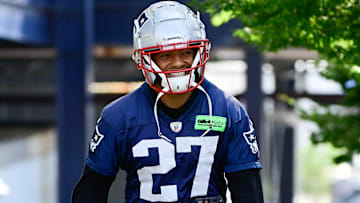 Former New England Patriots cornerback Myles Bryant (27)  makes his way to the practice fields for training camp at Gillette Stadium.