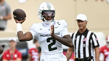 Oct 18, 2025; Bloomington, Indiana, USA; Michigan State Spartans quarterback Aidan Chiles (2) throws a pass during the first half against the Indiana Hoosiers at Memorial Stadium. Mandatory Credit: Robert Goddin-Imagn Images