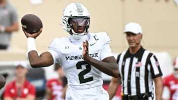 Oct 18, 2025; Bloomington, Indiana, USA; Michigan State Spartans quarterback Aidan Chiles (2) throws a pass during the first half against the Indiana Hoosiers at Memorial Stadium. Mandatory Credit: Robert Goddin-Imagn Images