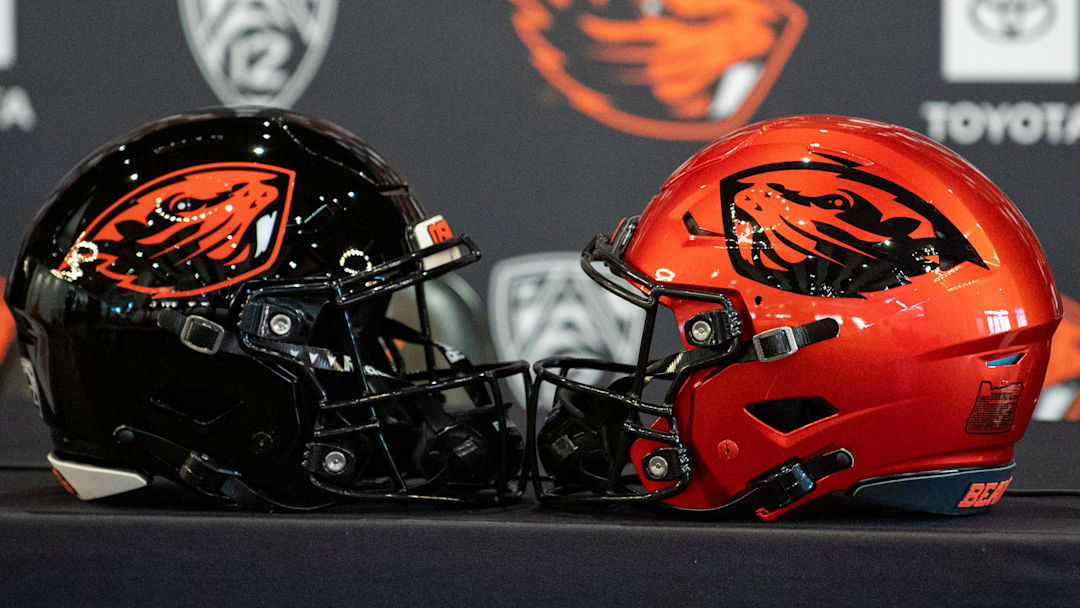 Oregon State football helmets sit on a table before the introductory press conference of the hiring of its new head football coach, JaMarcus Shephard, at Reser Stadium on Tuesday, Dec. 2, 2025, in Corvallis, Ore.
