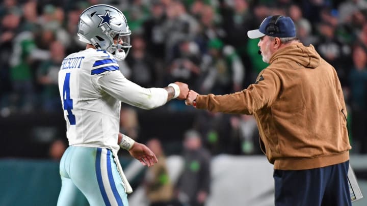 Nov 5, 2023; Philadelphia, Pennsylvania, USA; Dallas Cowboys quarterback Dak Prescott (4) and head coach Mike McCarthy after a touchdown in the third quarter against the Philadelphia Eagles at Lincoln Financial Field. 