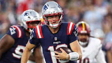 Aug 8, 2025; Foxborough, Massachusetts, USA; New England Patriots quarterback Drake Maye (10) runs the ball during the first half against the Washington Commanders at Gillette Stadium. Mandatory Credit: Paul Rutherford-Imagn Images