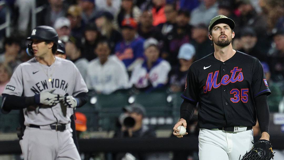 May 15, 2026; New York City, New York, USA; New York Mets catcher Luis Torrens (13) looks down at the leg of pitcher Clay Holmes (35) during the fifth inning against the New York Yankees at Citi Field. Mandatory Credit: Vincent Carchietta-Imagn Images