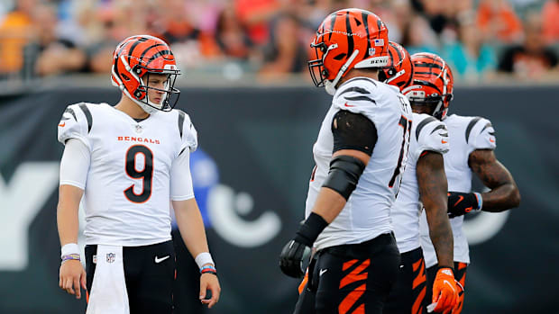 Joe Burrow (9) steps back between plays in the first quarter of the NFL Preseason Week 3 game between the Cincinnati Bengals 