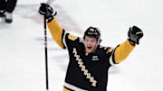 Dec 3, 2024; Pittsburgh, Pennsylvania, USA;  Pittsburgh Penguins defenseman Owen Pickering (38) reacts after scoring his first career NHL goal against the Florida Panthers during the first period at PPG Paints Arena. Mandatory Credit: Charles LeClaire-Imagn Images
