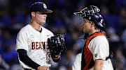 Jun 9, 2024; Lexington, KY, USA; Oregon State Beavers pitcher Jacob Kmatz (35) talks with catcher Wilson Weber (18) during the fourth inning against the Kentucky Wildcats at Kentucky Proud Park. Mandatory Credit: Jordan Prather-Imagn Images