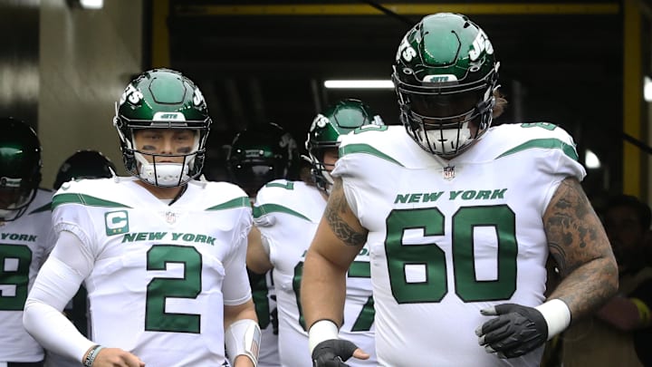 Oct 2, 2022; Pittsburgh, Pennsylvania, USA;  New York Jets quarterback Zach Wilson (2) and center Connor McGovern (60) take the field to warm up before the game against the Pittsburgh Steelers at Acrisure Stadium. 