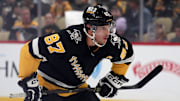Dec 10, 2024; Pittsburgh, Pennsylvania, USA;  Pittsburgh Penguins center Sidney Crosby (87) prepare to take a face-off against the Colorado Avalanche during the first period at PPG Paints Arena. Mandatory Credit: Charles LeClaire-Imagn Images