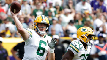 Green Bay Packers quarterback Sean Clifford (6) passes the ball during a preseason game against the Baltimore Ravens on Aug. 24, 2024, at Lambeau Field in Green Bay, Wis.