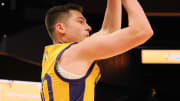 Jul 6, 2024; San Francisco, CA, USA; Los Angeles Lakers guard Kyle Mangas (50) shoots the ball against the Sacramento Kings during the fourth quarter at Chase Center. Mandatory Credit: Kelley L Cox-USA TODAY Sports