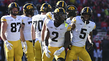 Nov 23, 2024; College Park, Maryland, USA;  Iowa Hawkeyes running back Kaleb Johnson (2) celebrates after scoring a touchdown during the first half against the Maryland Terrapins at SECU Stadium.