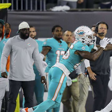 Cincinnati Bengals wide receiver Tee Higgins (85) catches a pass against Miami Dolphins cornerback Xavien Howard (25) in the first half at Paycor Stadium in a 2022 game.