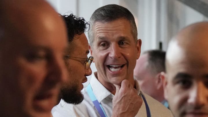 John Harbaugh and Mike McDaniel spoke at the league meetings last year.