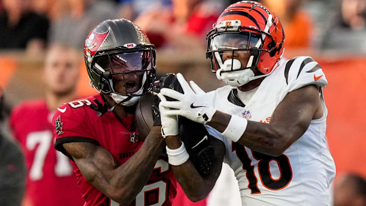 Tampa Bay Buccaneers cornerback Keenan Isaac (16) intercepts a pass intended for Cincinnati Bengals wide receiver Kwamie Lassiter II (18) in the second quarter of the NFL Preseason Week 1 game between the Cincinnati Bengals and the Tampa Bay Buccaneers at Paycor Stadium in downtown Cincinnati on Saturday, Aug. 10, 2024.