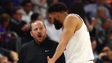 Nov 20, 2024; Phoenix, Arizona, USA; New York Knicks head coach Tom Thibodeau with center Karl-Anthony Towns (32) against the Phoenix Suns at Footprint Center. Mandatory Credit: Mark J. Rebilas-Imagn Images