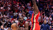 Oct 23, 2024; New Orleans, Louisiana, USA;  Chicago Bulls forward Patrick Williams (44) dribbles against New Orleans Pelicans center Yves Missi (21) during the first half at Smoothie King Center. 