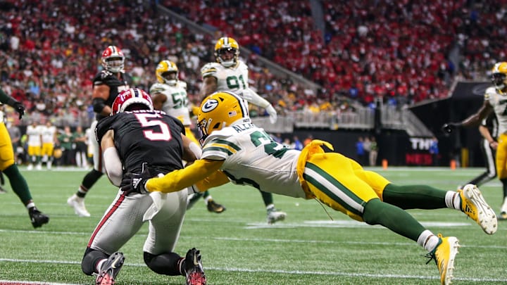 Sep 17, 2023; Atlanta, Georgia, USA; Atlanta Falcons wide receiver Drake London (5) catches a touchdown past Green Bay Packers cornerback Jaire Alexander (23) in the second quarter at Mercedes-Benz Stadium. Mandatory Credit: Brett Davis-Imagn Images