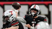 North Oconee's Harrison Faulkner (1) throws a pass during the GHSA Division 4A Football State Championship game in Atlanta, on Monday, Dec. 16, 2024.