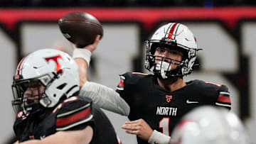 North Oconee's Harrison Faulkner (1) throws a pass during the GHSA Division 4A Football State Championship game in Atlanta, on Monday, Dec. 16, 2024.