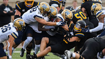Montana State defense swarms to the football in a game against South Dakota State in 2023.