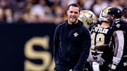 Dec 15, 2024; New Orleans, Louisiana, USA;  New Orleans Saints quarterback Derek Carr (4) after a touchdown against the Washington Commanders during the second half at Caesars Superdome. Mandatory Credit: Stephen Lew-Imagn Images