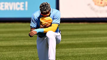 Feb 24, 2024; Port Charlotte, Florida, USA; Tampa Bay Rays third baseman Junior Caminero (13) prepares for the start of the spring training game against the Atlanta Braves at Charlotte Sports Park. Mandatory Credit: Jonathan Dyer-Imagn Images