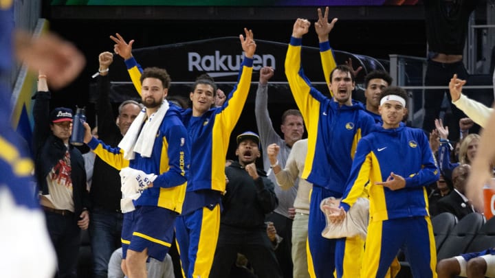 Nov 16, 2023; San Francisco, California, USA; The Golden State Warriors bench reacts to a three-point basket against the Oklahoma City Thunder during the third quarter at Chase Center. Mandatory Credit: D. Ross Cameron-USA TODAY Sports