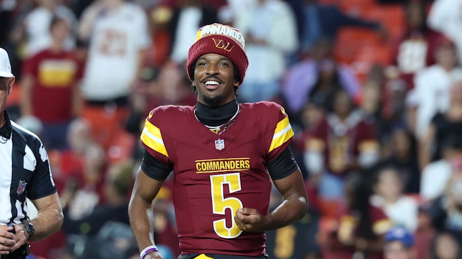 Washington Commanders quarterback Jayden Daniels (5). | Amber Searls-Imagn Images