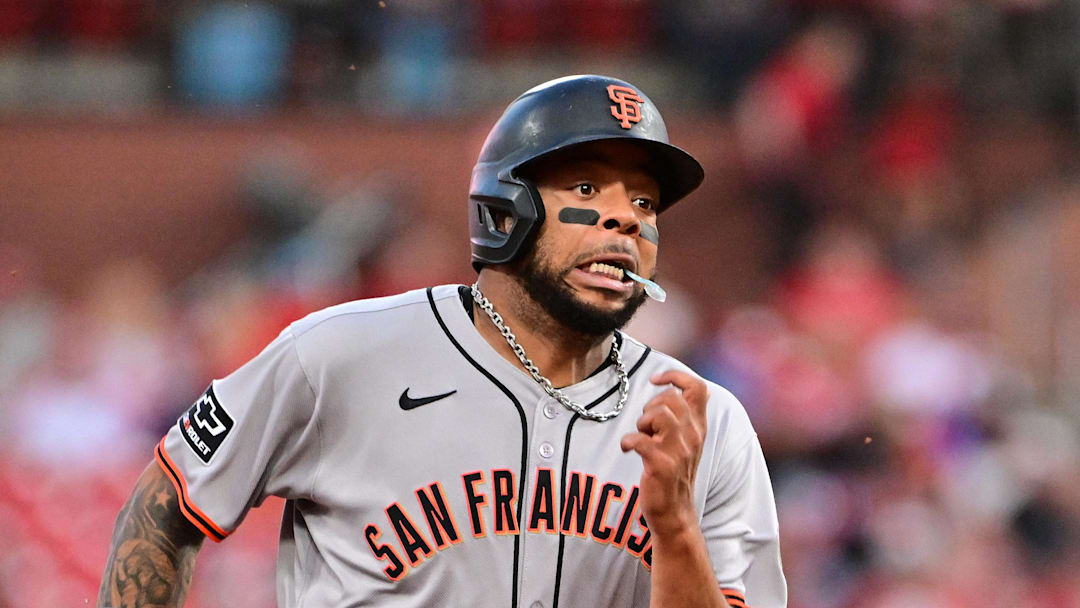 Sep 6, 2025; St. Louis, Missouri, USA; San Francisco Giants first baseman Dominic Smith (7) runs to third base in a game against the St. Louis Cardinals at Busch Stadium. Mandatory Credit: Tim Vizer-Imagn Images