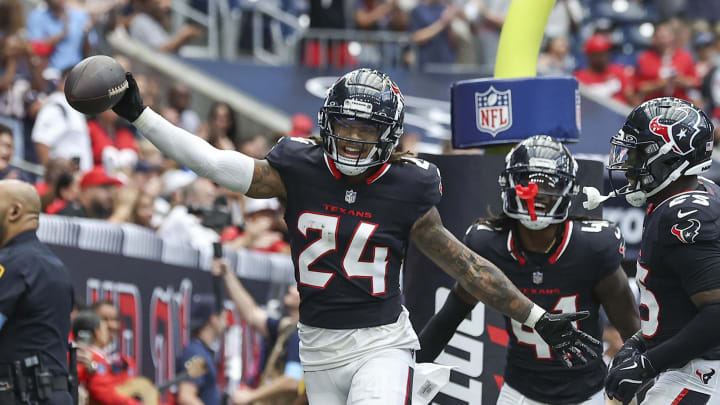 Aug 17, 2024; Houston, Texas, USA; Houston Texans cornerback Derek Stingley Jr. (24) celebrates after an interception during the first quarter against the New York Giants at NRG Stadium. Mandatory Credit: Troy Taormina-USA TODAY Sports