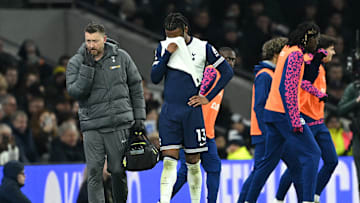 Destiny Udogie looks dejected after being taken off against Wolves