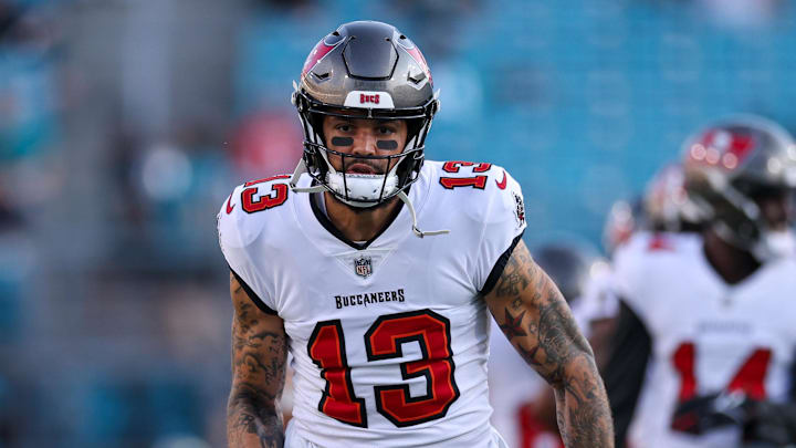 Aug 17, 2024; Jacksonville, Florida, USA; Tampa Bay Buccaneers wide receiver Mike Evans (13) warms up before a preseason game against the Jacksonville Jaguars at EverBank Stadium. Mandatory Credit: Nathan Ray Seebeck-Imagn Images