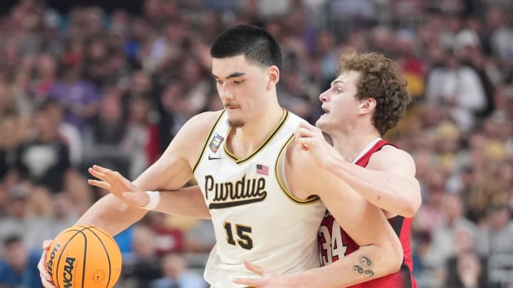 Apr 6, 2024; Glendale, AZ, USA; Purdue Boilermakers center Zach Edey (15) is defended by NC State. Apr 6, 2024; Glendale, AZ, USA; Purdue Boilermakers center Zach Edey (15) is defended by NC State.