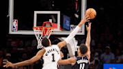 Nov 2, 2025; Phoenix, Arizona, USA; San Antonio Spurs forward Victor Wembanyama (1) blocks Phoenix Suns forward Oso Ighodaro (11) during the first half